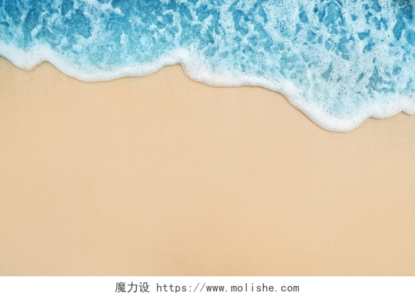 蓝色大海和黄色的沙滩相融合沙滩上的蓝色海浪软绵延背景..